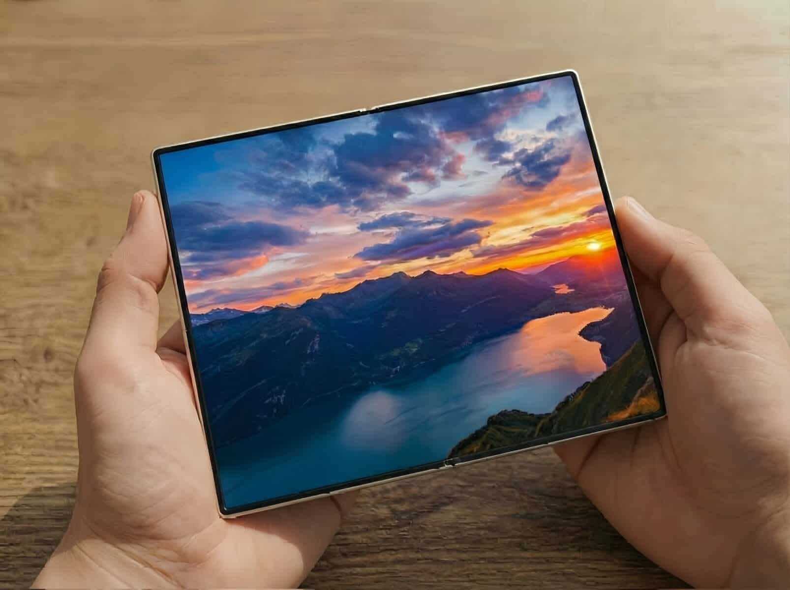 Uma imagem de um smartphone dobrável com uma paisagem de pôr do sol na tela, destacando tecnologia a.